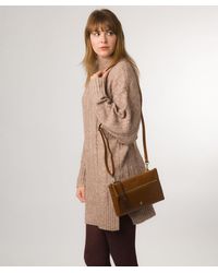 Conkca - 'Minnow' Dark Tan Leather Cross Body Clutch Bag - Lyst