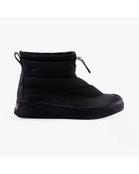 Sorel - Out N About Iv Puffy Ankle Low Heeled Ankle Boots - Lyst