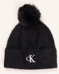 Calvin Klein - Mütze mit Kunstfell - Lyst