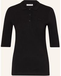 Lacoste - Piqué-Poloshirt mit 3/4-Arm - Lyst