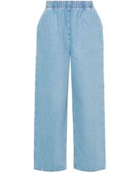 Prada - Triangle-logo Mid-rise Loose-fit Jeans - Lyst