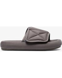Women's Yeezy Slippers from $85 | Lyst