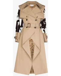 Womens Clothing Coats Raincoats and trench coats Alexander McQueen Cotton Panelled Belted Trench Coat in Natural 