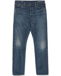Visvim - Mid-rise Tapered Jeans - Lyst
