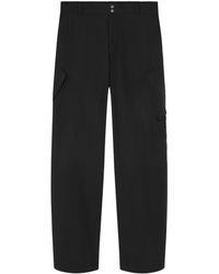Versace - Pants & Shorts - Lyst