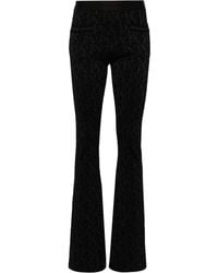 Palm Angels - Monogram-jacquard Knitted Flared Trousers - Lyst