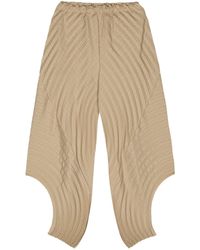 Issey Miyake - Beige Curved Pleats Tapered Trousers - Lyst