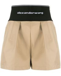 Alexander Wang - Logo-Waist Pleated Shorts - Lyst