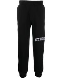 Givenchy - Logo-embroidered Tapered Sweatpants - Lyst