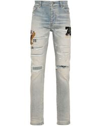 Amiri - Light Thigh Patches Ripped Skinny Jeans - Lyst