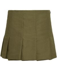Prada - Pleated Canvas Mini Skirt - Lyst