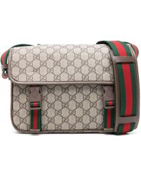 Gucci - GG Supreme Leather-trimmed Monogrammed Coated-canvas Messenger Bag - Lyst