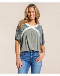 Daytrip - Pieced Floral Dolman Top - Lyst