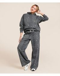 Gilded Intent - Washed Cheetah Wide Leg Sweatpant - Lyst