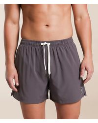 Cove - Solid Stretch Swim Trunks - Lyst