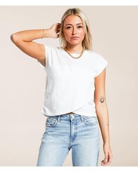 Gilded Intent - Surplice Hem Top - Lyst