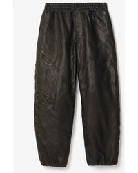 Burberry - Cursive Logo Leather Trousers - Lyst