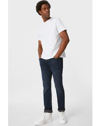 C&A Tapered jean-LYCRA® Jean The Denim pour homme en coloris Noir Homme Vêtements Jeans Jeans fuselés 