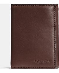 coach wallets tri-fold