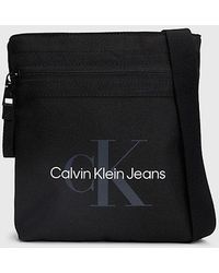 Calvin Klein - Flache Crossbody Bag mit Logo - Lyst