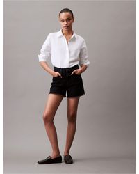 Calvin Klein - High Rise Midi Denim Shorts - Lyst