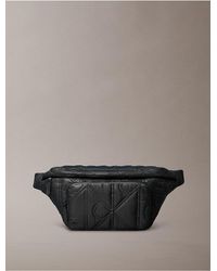 Calvin Klein - Puffer Monogram Logo Sling Bag - Lyst