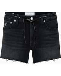 Calvin Klein Shorts denim con cintura anudada - Negro