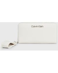 Calvin Klein - Portefeuille zippé anti-RFID avec dragonne - Lyst