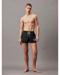 Calvin Klein - Short de bain court avec cordon de serrage - CK Monogram - Lyst