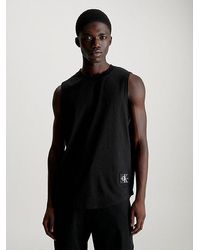 Calvin Klein - Camiseta de tirantes de algodón con insignia - Lyst