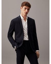 Calvin Klein - Veste blazer slim simple boutonnage en laine lastique - Lyst