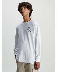 Calvin Klein - Camiseta de manga larga con estampado en la parte trasera - Lyst
