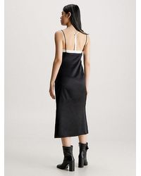 Calvin Klein - Vestido lencero midi de satén - Lyst