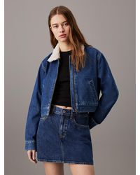 Calvin Klein - Cropped Zip Up Denim Jacket - Lyst