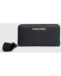 Calvin Klein - RFID-Portemonnaie mit Rundum-Reißverschluss und Handgelenkriemen - Lyst