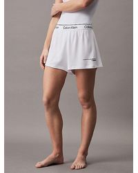 Calvin Klein - Shorts de playa de felpa holgados - CK Meta Legacy - Lyst