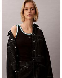 Calvin Klein - Jeans Contrast Trim Ribbed Logo Graphic Tank Top - Lyst