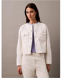 Calvin Klein - Calvin Klein Cropped Collarless Denim Trucker Jacket - Lyst