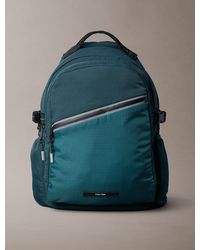 Calvin Klein - Striped Utility Zip Round Backpack - Lyst