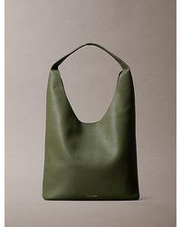 Calvin Klein - Pebble Grain Slouchy Curved Bag - Lyst