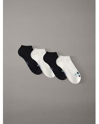 Calvin Klein - Jeans 4 Pack Soft Cotton Logo Trainer Socks - Lyst