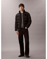 Calvin Klein - Chaqueta de plumas con monograma - Lyst
