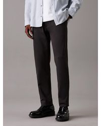 Calvin Klein - Tapered Pleated Knit Trousers - Lyst
