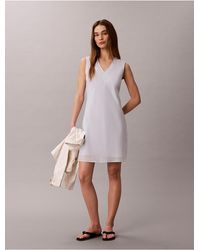 Calvin Klein - Calvin Klein Cotton Blend V-Neck Mini Dress - Lyst