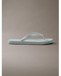 Calvin Klein - Arwa Metallic Pearlised Flip Flops - Lyst