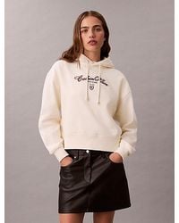 Calvin Klein - Fleece Script Logo Graphic Cropped Hoodie - Lyst