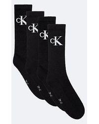 Calvin Klein - Pack de 4 pares de calcetines de deporte de algodón peinado suave con logo - Lyst