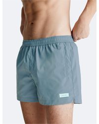 Calvin Klein - Solid Tonal Swim Shorts - Lyst