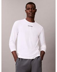 Calvin Klein - Ademend Sneldrogend Sportief T-Shirt Met Lange Mouwen - Lyst
