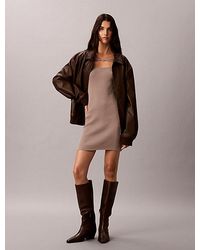 Calvin Klein - Jeans Emblem Logo Rib Mini Dress - Lyst